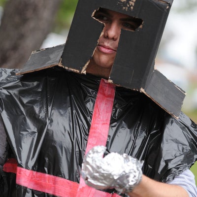 A man with a Black knight costume