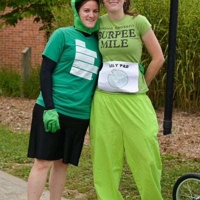 Two students wearing all green.
