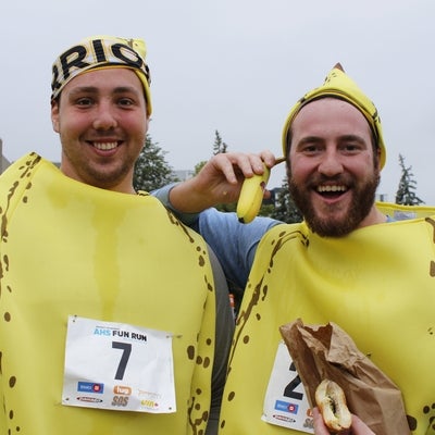 Two men in banana costumes 