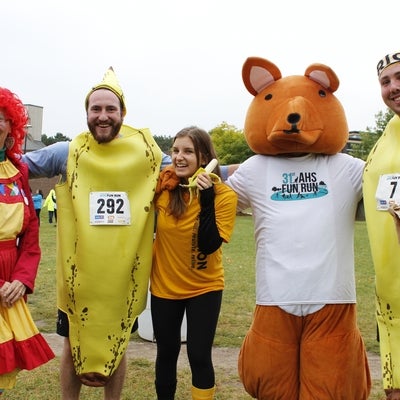 AHSSIE the mascot and participants dressed in costumes