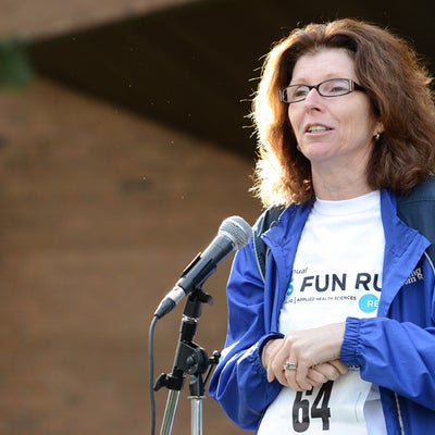 Dean Susan Elliott greeting the runners