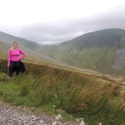 Tess standing by Mount Snowdon