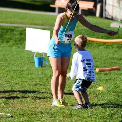 Participant and child jumping rope
