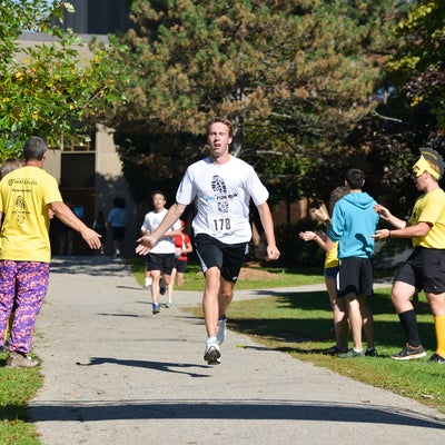 Participant passing the finish line