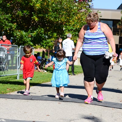 Family of participants passing the finish line