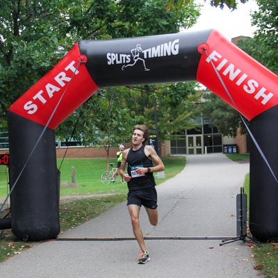 First place runner at finish line