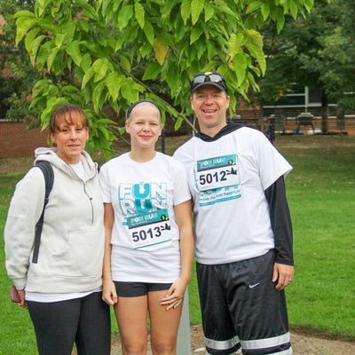 three participants smiling