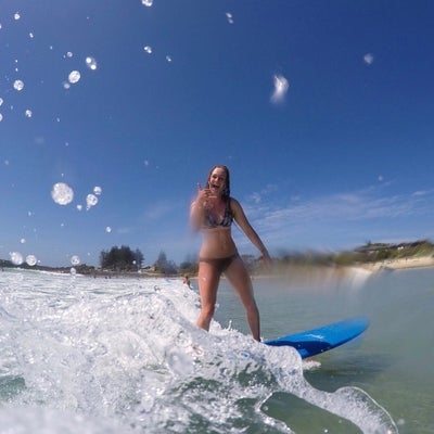 Meghan surfing 
