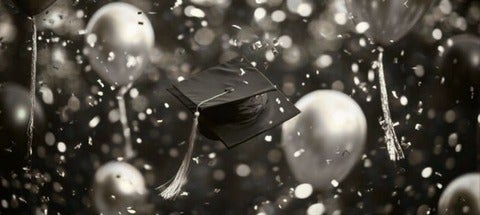 Graduation hat and balloons.