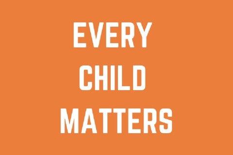 Every child matters message on orange background.
