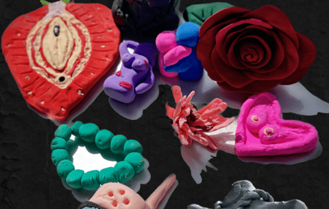 Polymer clay art pieces shaped as a vulva, rose, bracelet, and heart.
