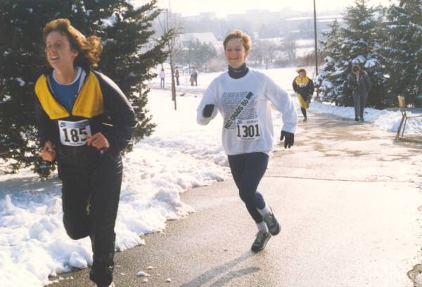 Two female runners running