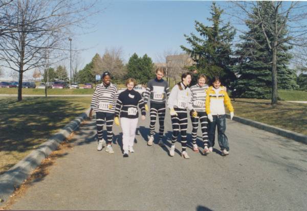 Six runners with Zebra-like customized clothing