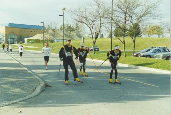 Three group of people dressed as ski riders. 