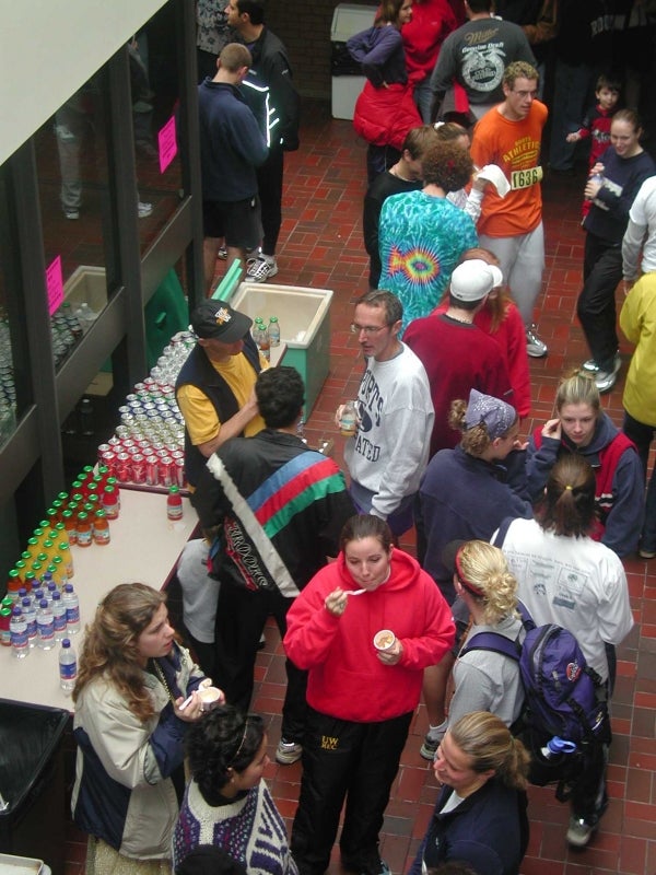 People receiving food and drinks after the race 