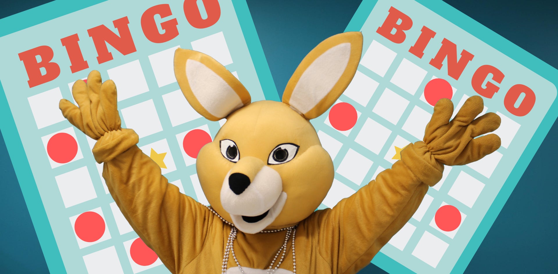 AHSSIE mascot in front of bingo cards