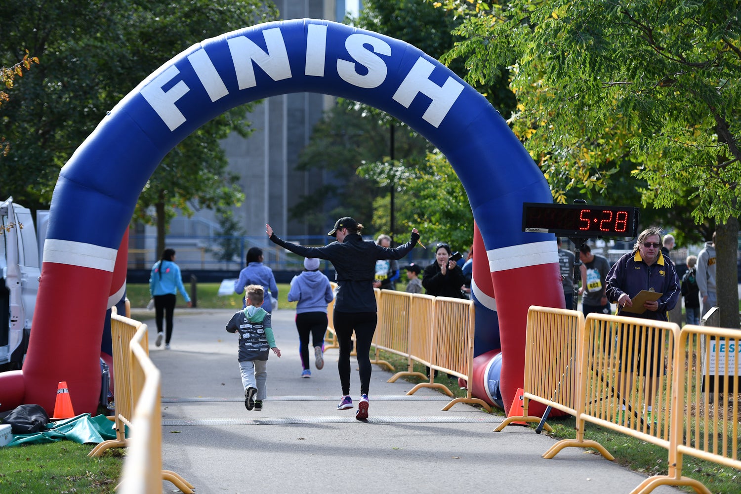 Participants running through finish line