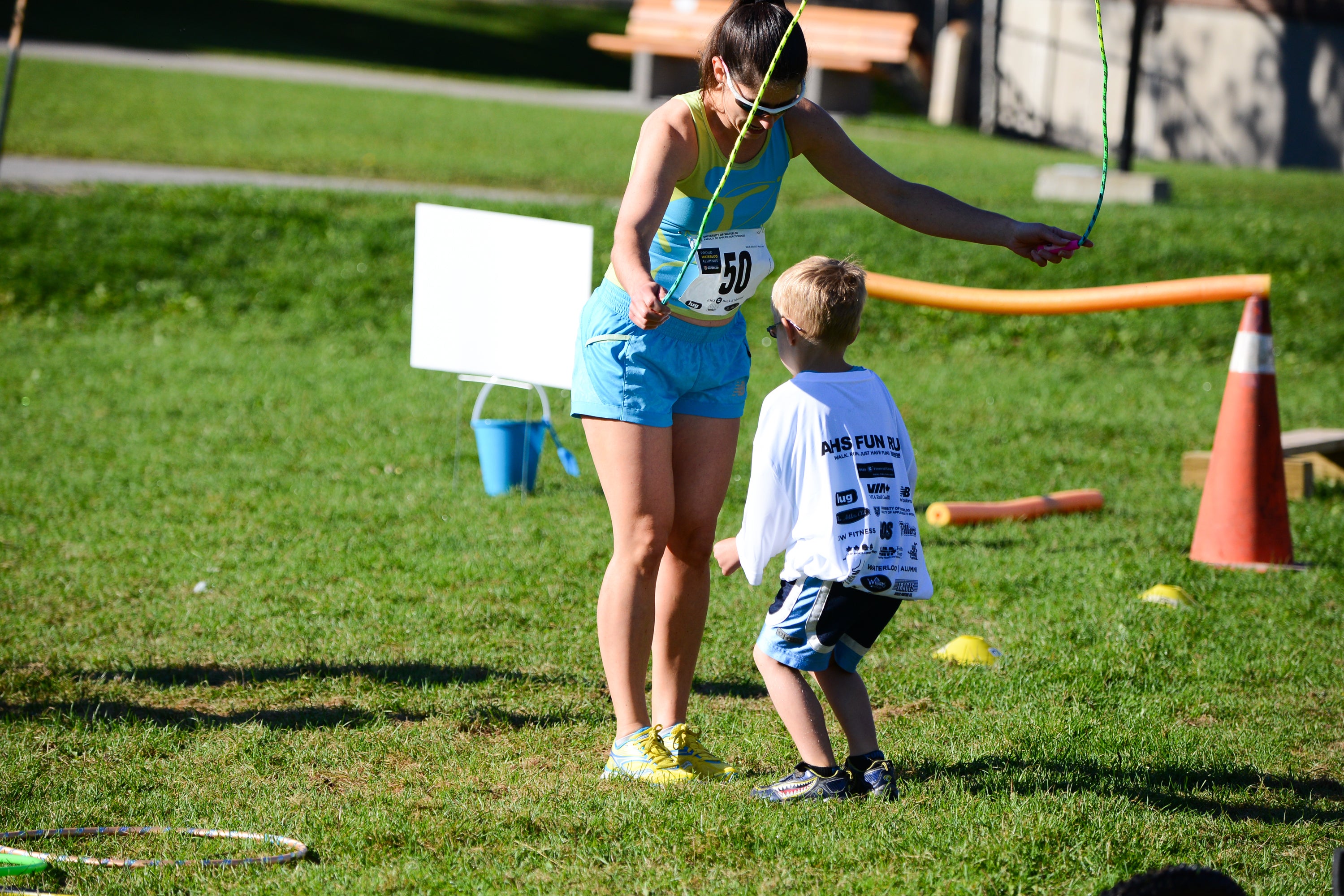 Participant and child jumping rope