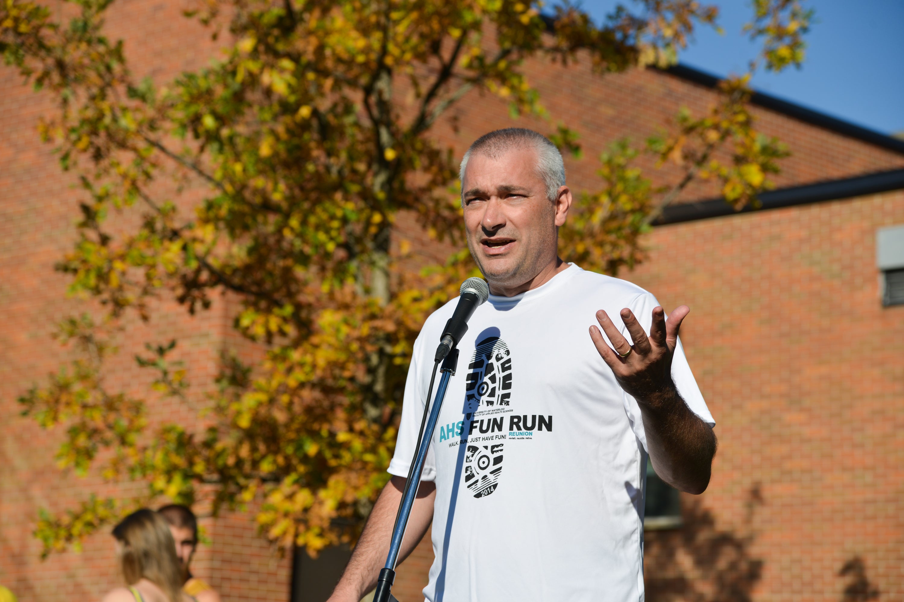Man addressing Fun Run participants