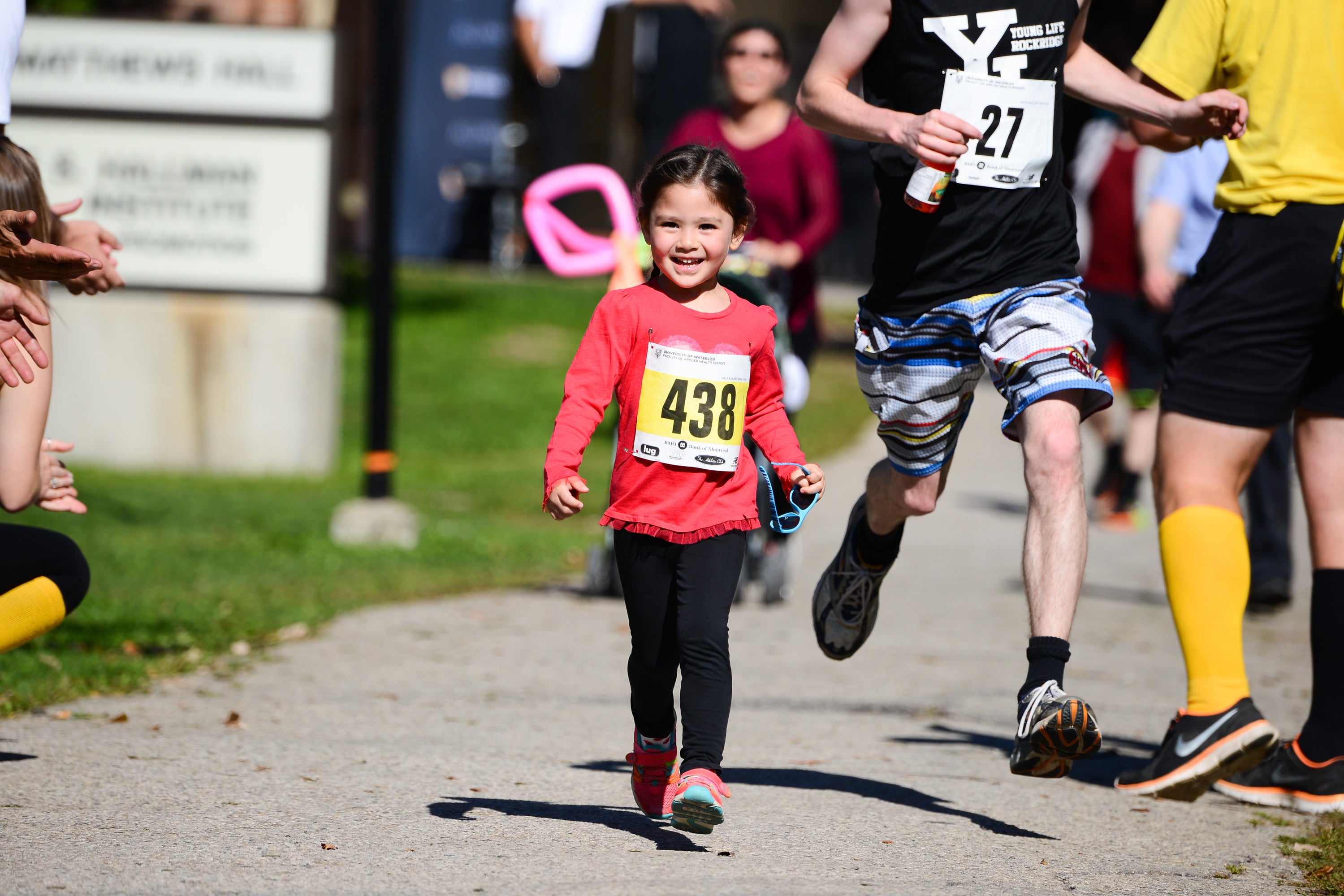 Child participant passing the finish line