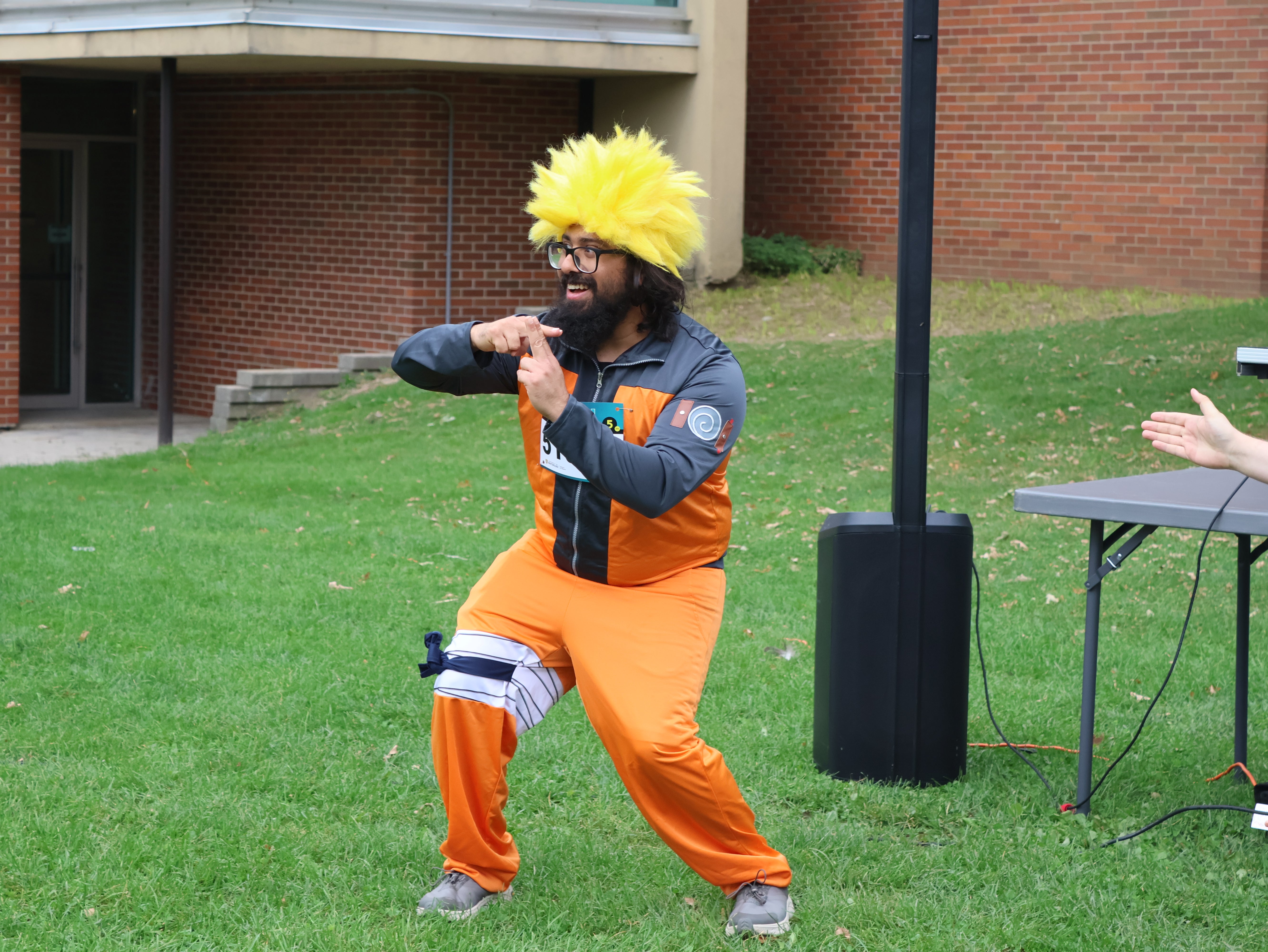 Naruto costume posing with jutsu hand sign