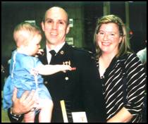 Lieutenant-Colonel Jim Kile with wife and daughter