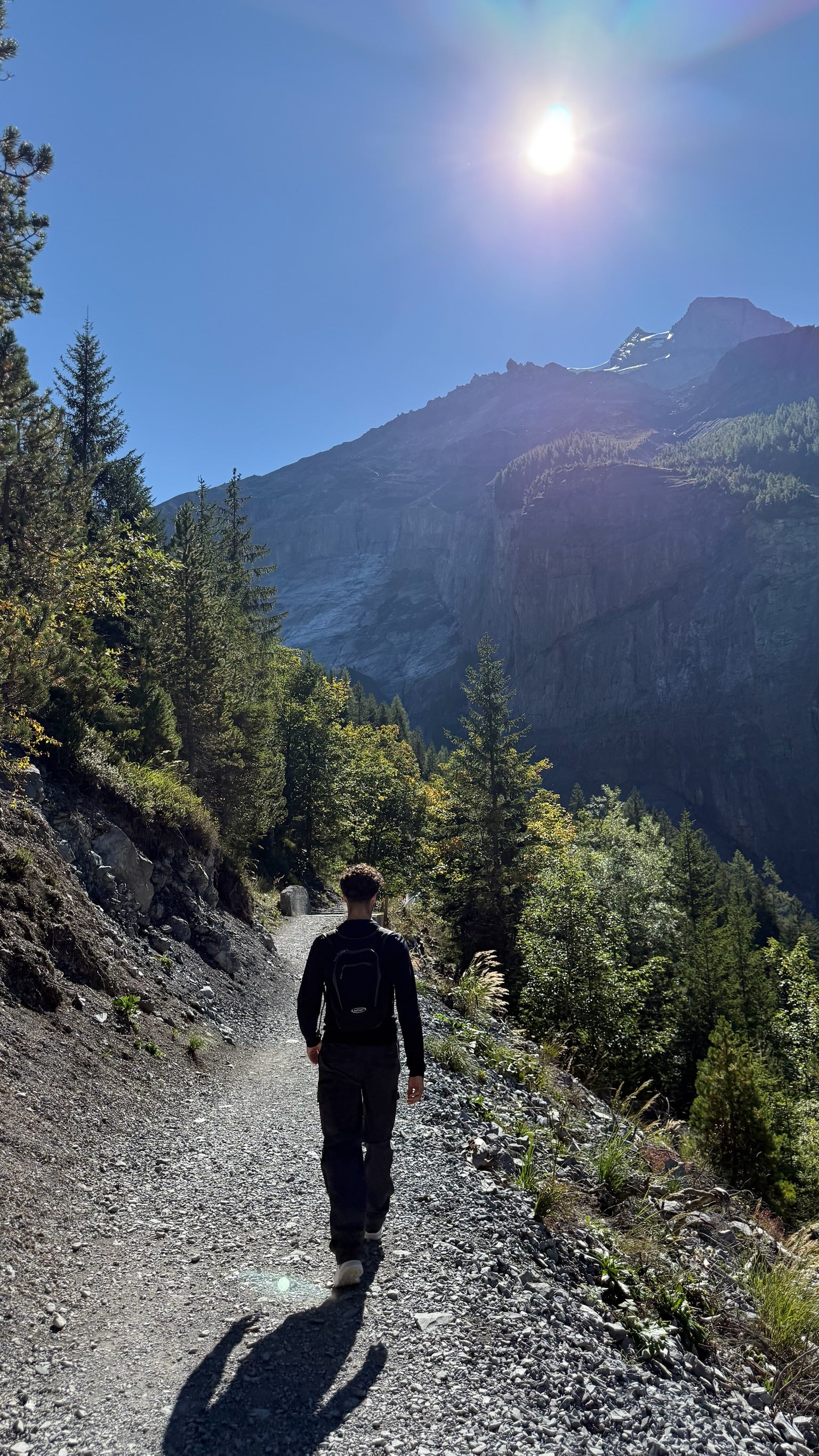 Julian on a hiking trail heading up to Lake Oeschinen.