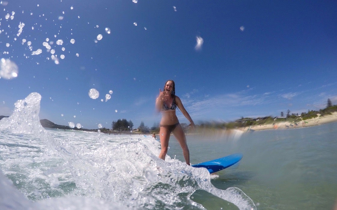 Meghan surfing 