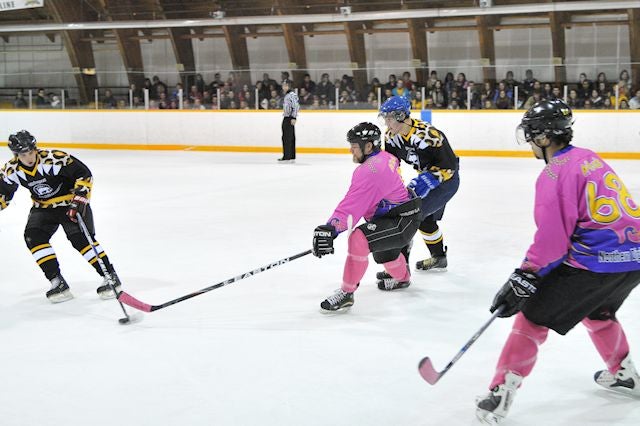 Hockey players at Aftab Patla Memorial Cup game.