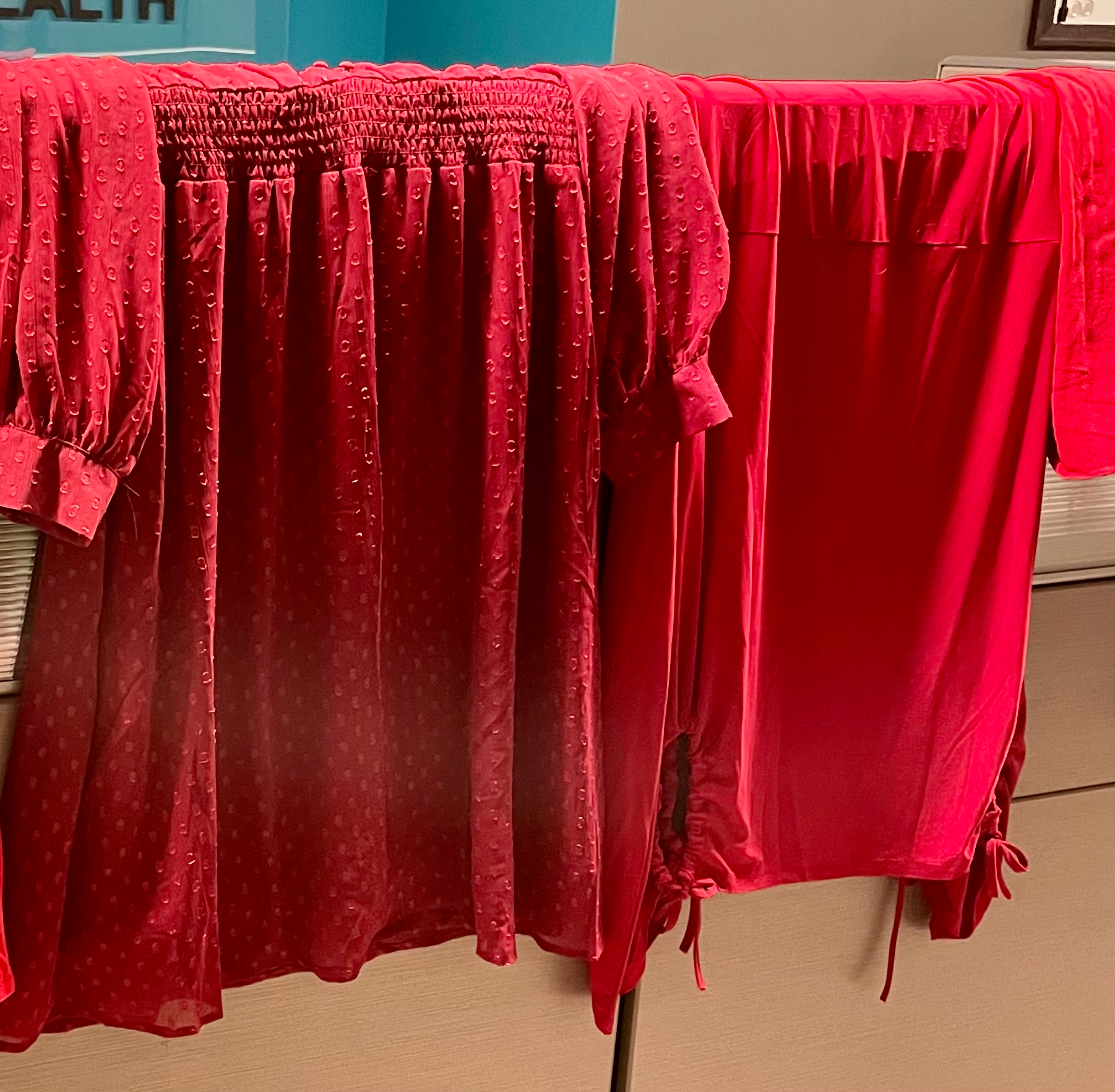 Red dresses hanging