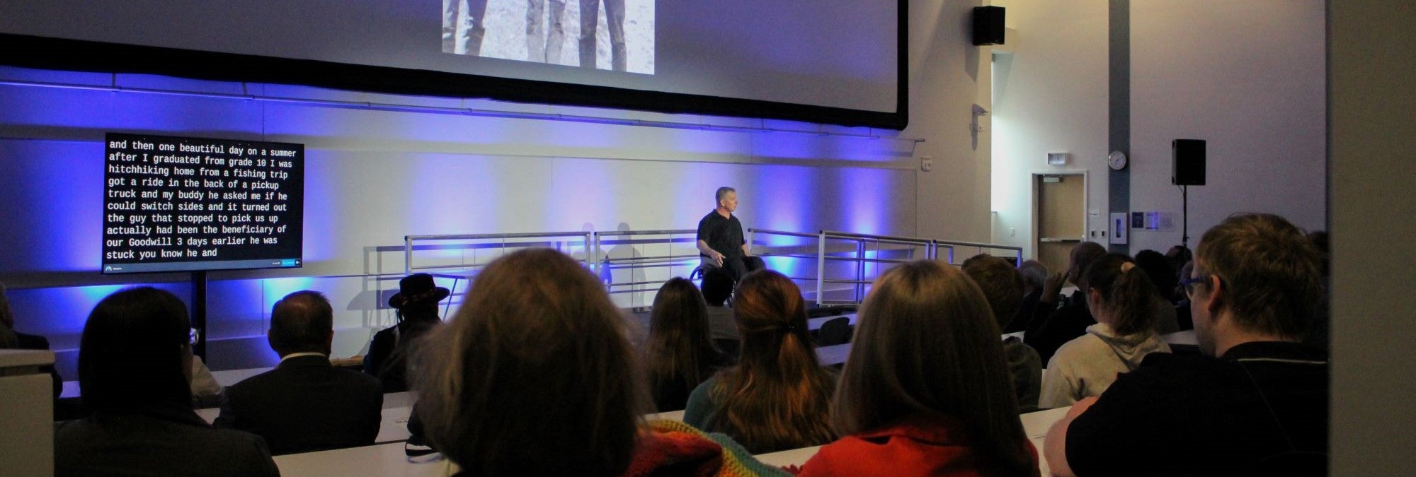 Rick Hansen speaks on stage at the University of Waterloo