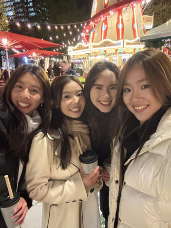 Beatrice and friends at a Christmas Night Market.