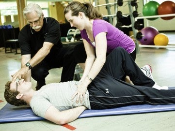 Dr. Stuart McGill instructing students on exercise