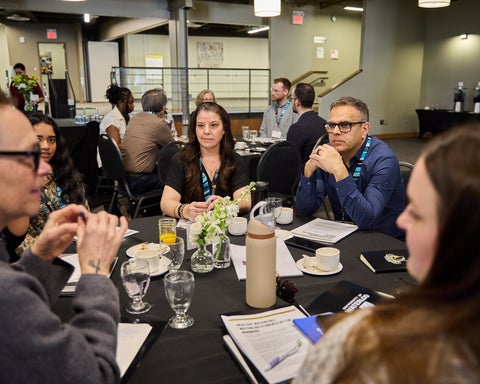 Table discussion with attendees at healthy waterloo summit