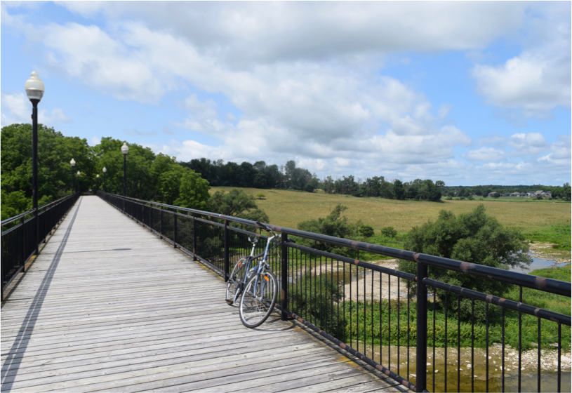 An image of the top of the bridge looking over the countryside