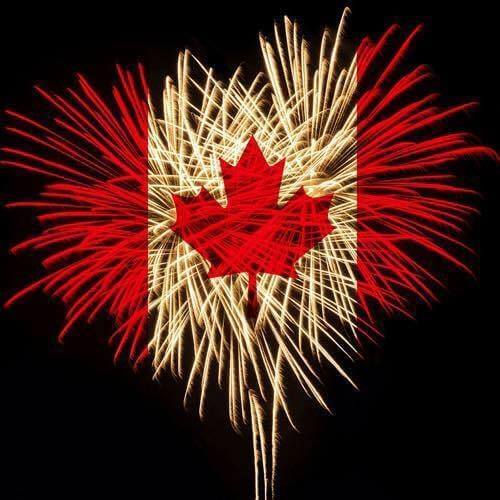 Fireworks at night in the style of the Candian Flag; red and white with a maple leaf in the middle