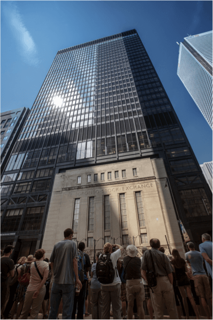 An image of the Toronto Stock Exchange building, a modern high rise building built upon the old existing building