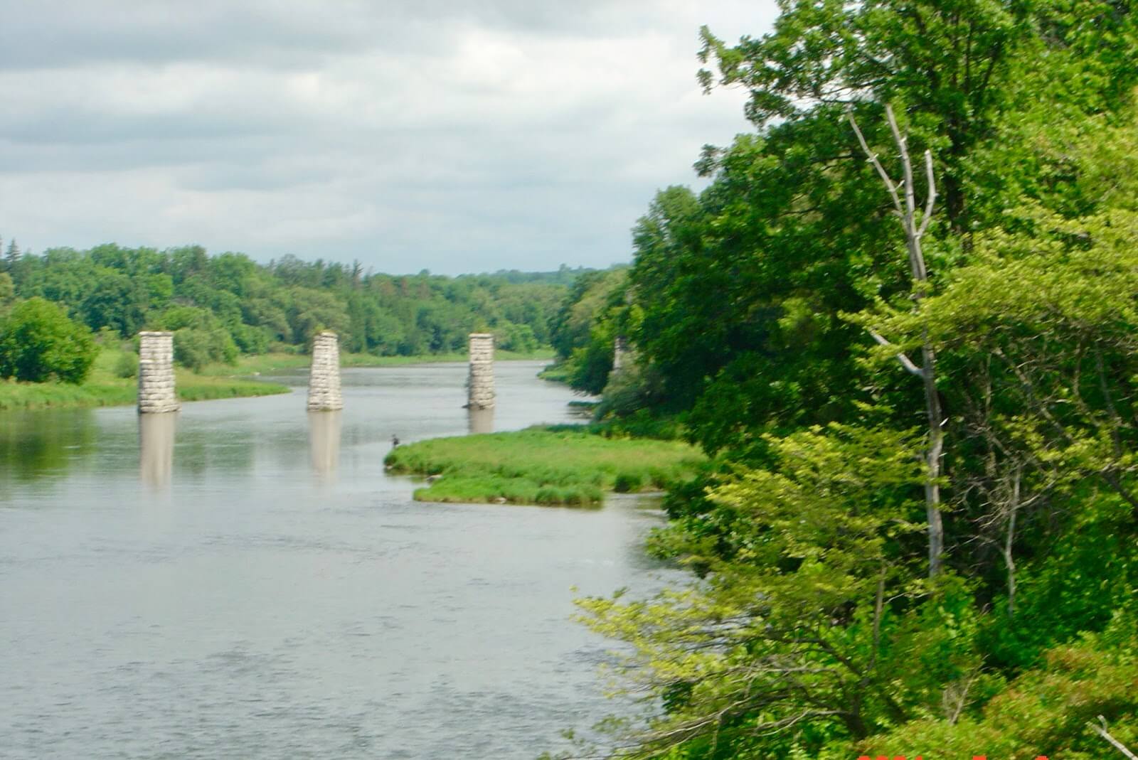 A river near Paris, Ontario with the pillars left from a broken bridge