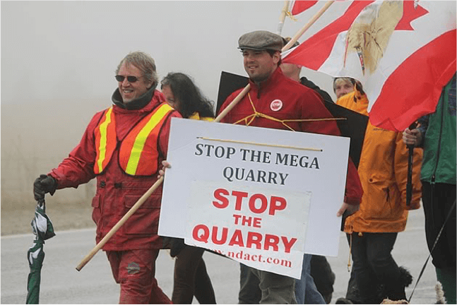 People protesting a quarry