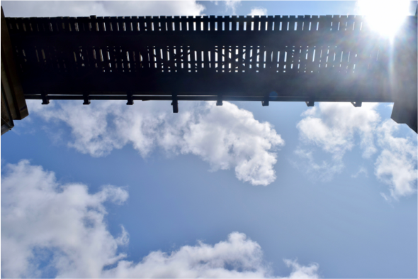 The underside of a bridge facing up