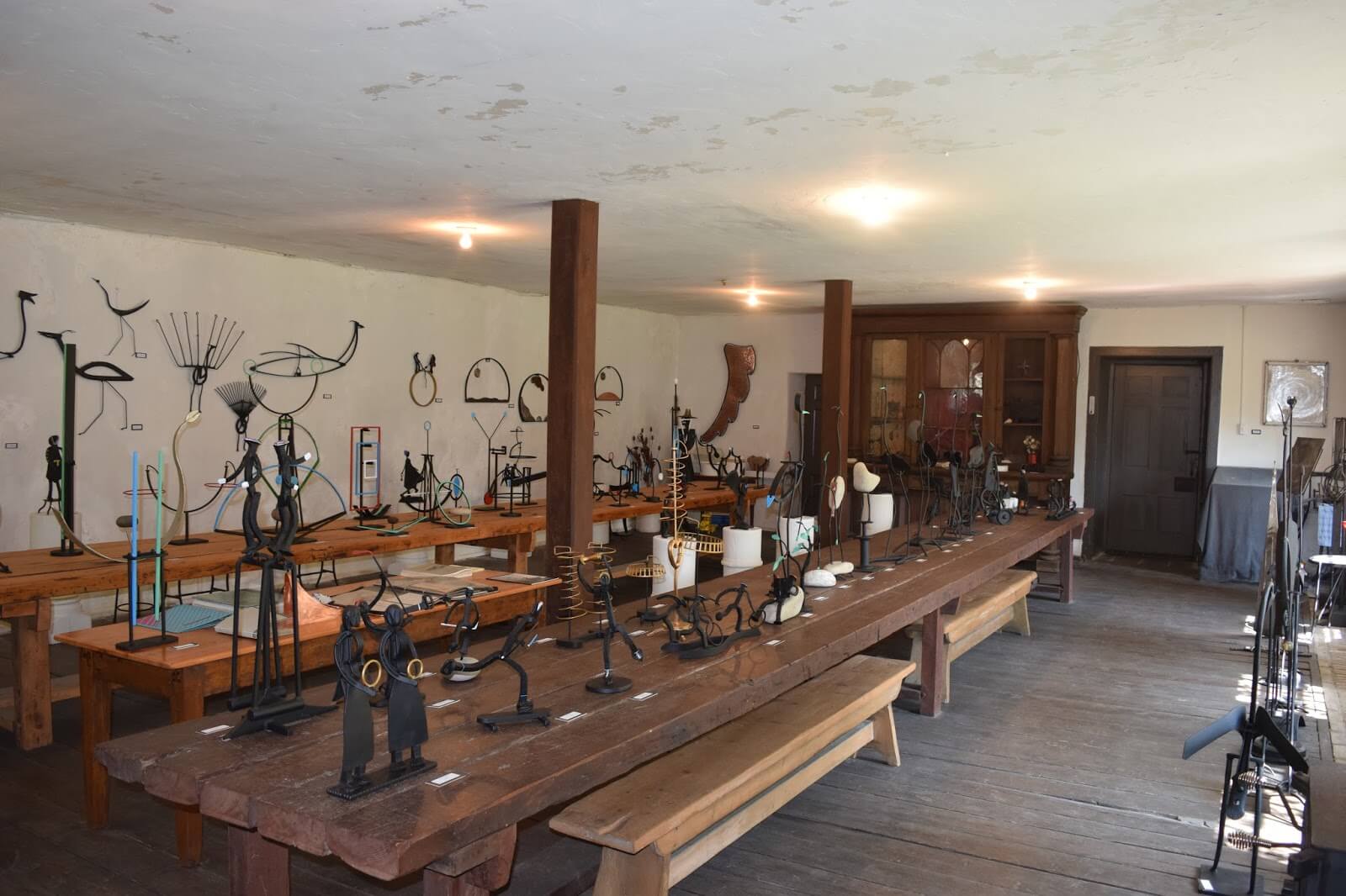 The interior of the Rockwood Academy refectory today, a room filled with sculptures created by Andy Drenters