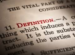 An image of the word 'definition' and the definition in a dictionary