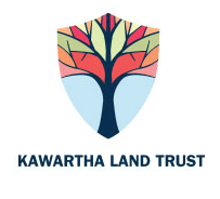 A shield-shaped symbol with a multi-coloured tree in the middle with the words "Kawartha Land Trust" underneath the symbol