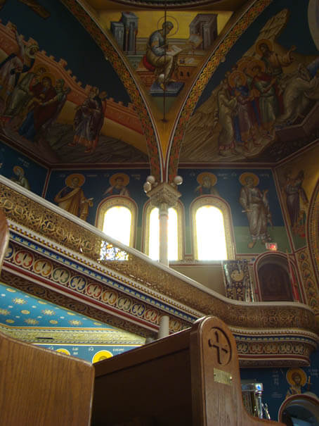 The ceiling and second floor of an Orthodox church.