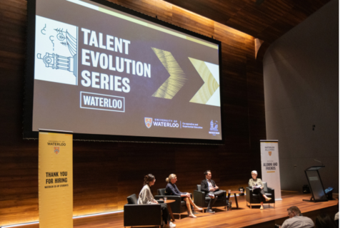 View of the panelists mid-discussion on stage during the event