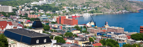 Mountainside view of a city in Atlantic Canada where downtown meets the oceanside