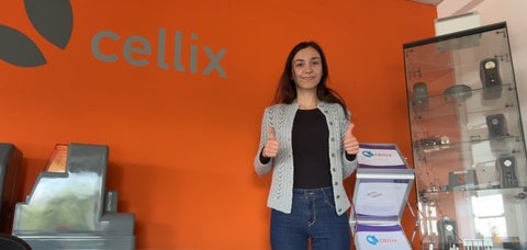 Photo of Diana Brebeanu, 4A Computer Science student standing behind Cellix's backdrop.