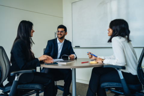 Co-op students talking in an interview. 