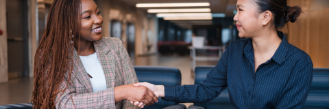 employer shaking student's hand