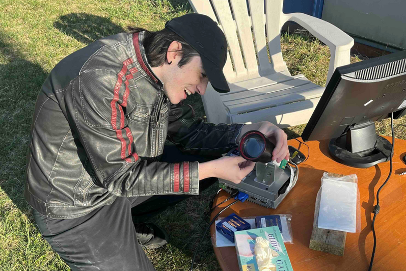 Co-op student, Noel, working on camera 